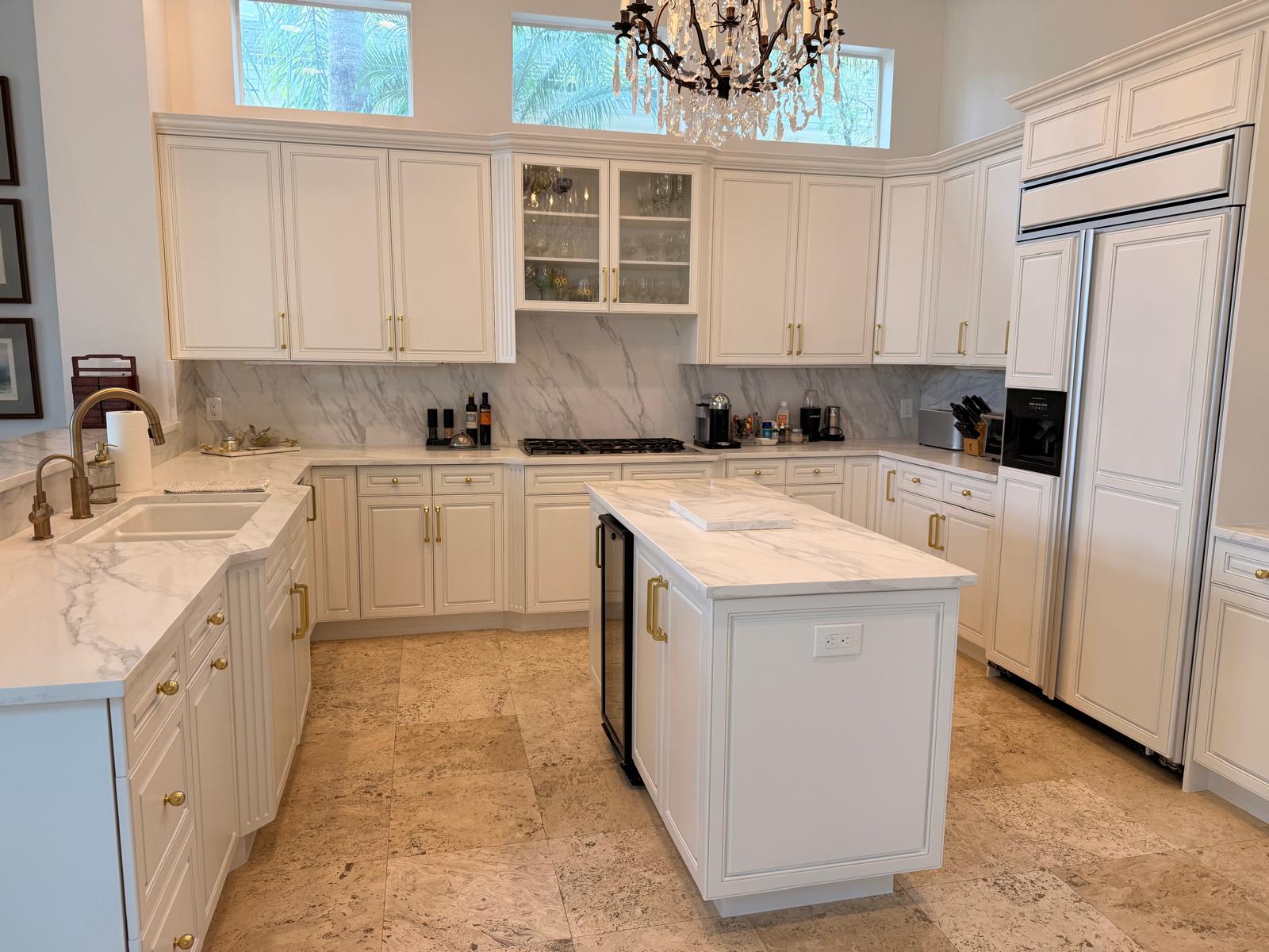 Finished white kitchen cabinet refinishing project by PhD Painting in South Florida